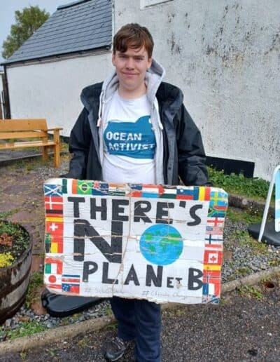 Finlay Pringle, Ullapool Shark Ambassador on his final School Strike for Climate Action in Ullapool.